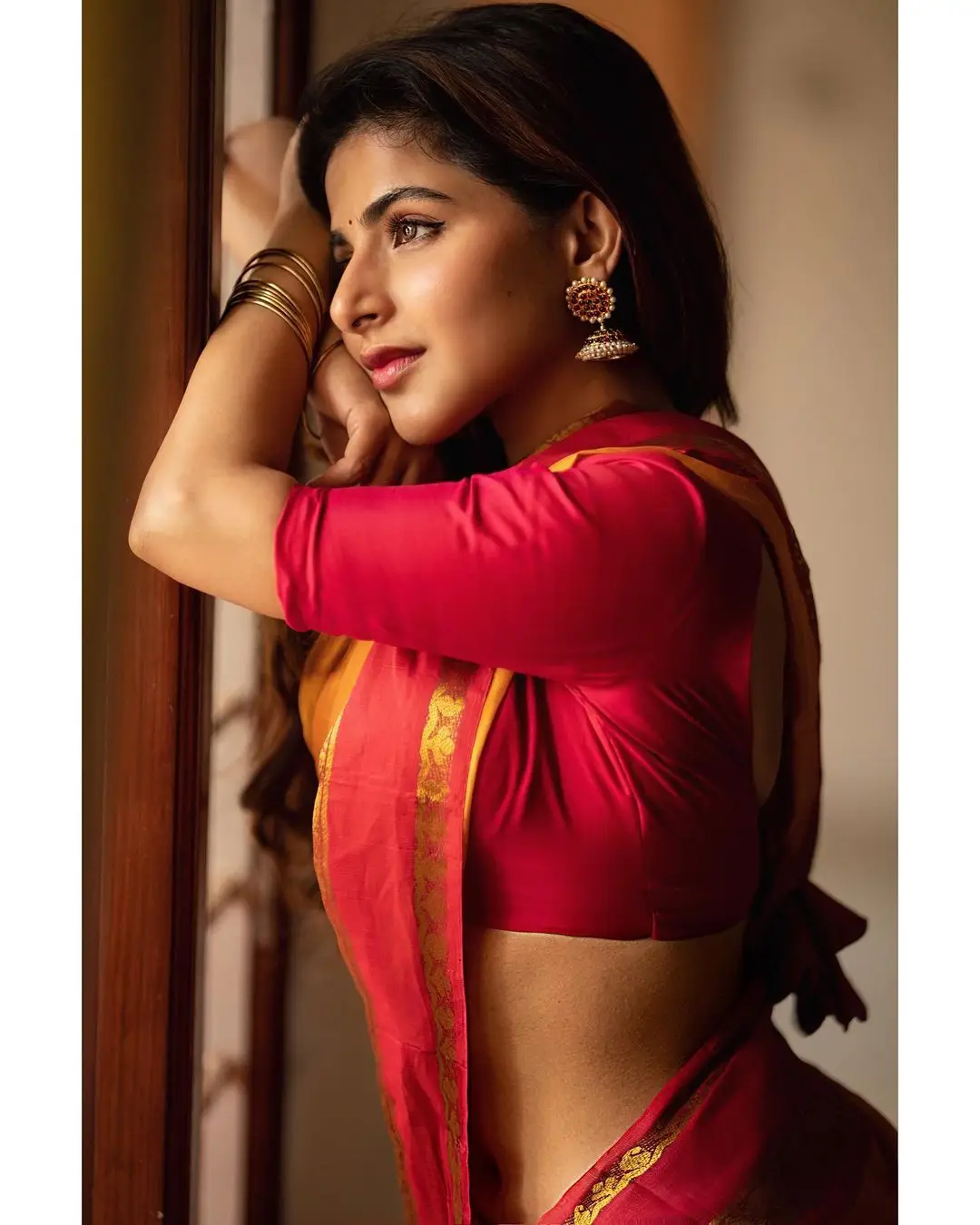 Indian Girl Iswarya Menon In Traditional Orange Saree Sleeveless Blouse